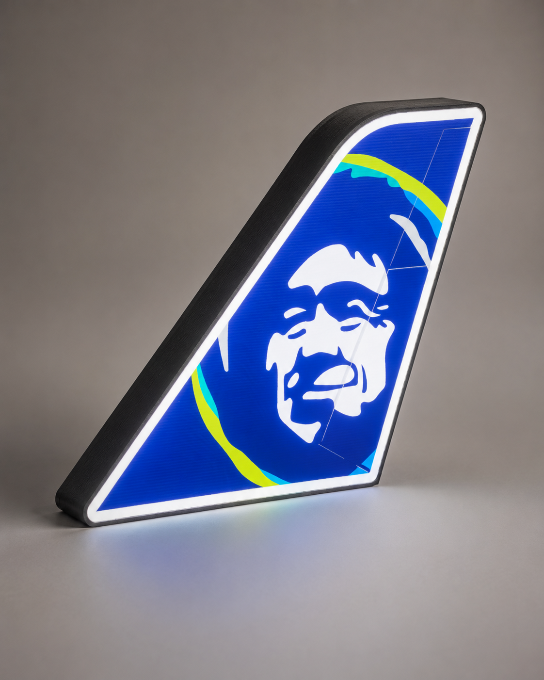Close-up detail of an illuminated Alaska-inspired tail light