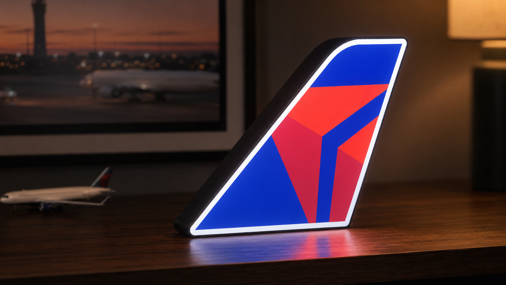 Illuminated Delta-inspired aircraft tail display light